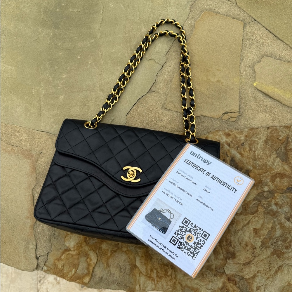 CHANEL Black Quilted Lambskin Flap Bag with Gold Hardware
